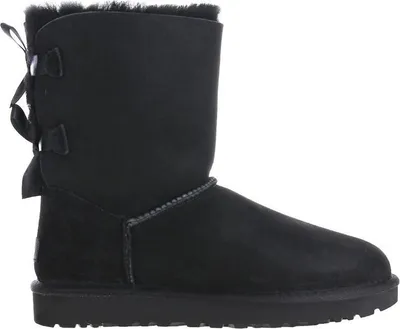 A black UGG boot with bows on the back.