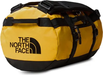 A yellow and black duffel bag with the North Face logo.