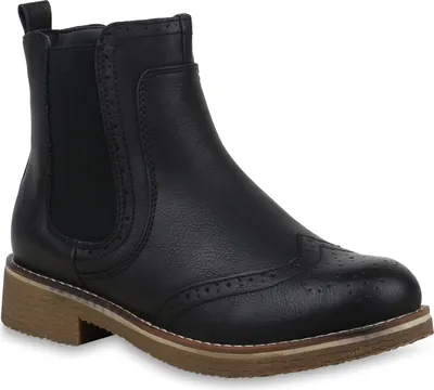 A black Chelsea boot with brogue detailing and a light brown sole, shown from a side angle on a white background.