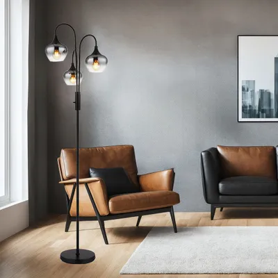 A modern living room with a floor lamp, a leather armchair, and a sofa.
