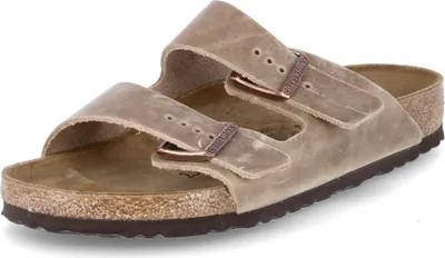 A single Birkenstock sandal is shown against a white background.