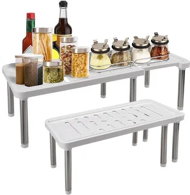 Immagine prodotto di Uniqoos® Scaffale regolabile e impilabile per la cucina, colore bianco – scaffale salvaspazio con colonne in acciaio inossidabile e ripiani robusti, lunghezza massima 64 cm