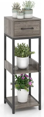 Immagine prodotto di Scaffale per piante a 3 ripiani con cassetto, tavolo alto per piante con kit antiribaltamento, robusta piattaforma espositiva per vasi da fiori con una portata massima di 60 kg