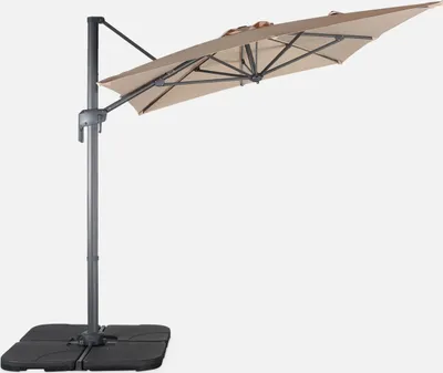 A cantilever umbrella with a beige canopy and a gray pole and base, isolated on a white background.