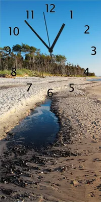 Produktbild von Wallario Design Wanduhr bedruckt, Größe 30 x 60 cm, Motiv: Einsamer Strand am Meer - Blauer Himmel