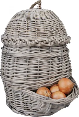 A woven basket for storing onions, with onions visible in the lower compartment.