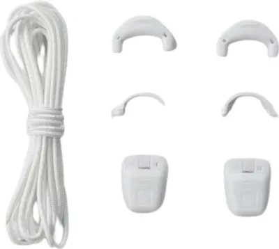 A bundle of white shoelaces and replacement parts for a shoe lacing system.