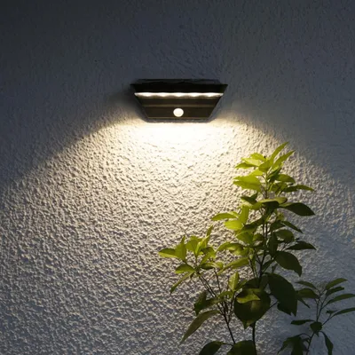 Produktbild von LED Solar Wandleuchte 'Wally' - 2 Stufen Helligkeit (40sec) - Bewegungs- & Dämmerungssensor - silber