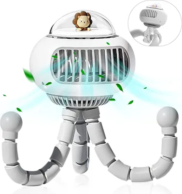 A white portable fan with a cute lion decoration on top, supported by a flexible tripod stand. The fan is shown with air blowing out, illustrated by blue wavy lines and green leaves.