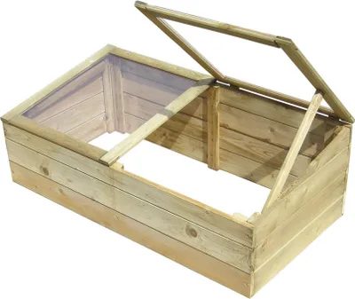 A wooden cold frame with a hinged glass lid, shown outdoors against a white background.