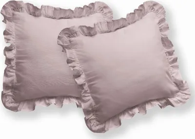 Two pink decorative pillows with ruffles.