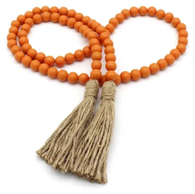 Produktbild von Holzperlen Girlande mit Quasten 150 cm Orange 16 mm Perlendurchmesser Juteseil
