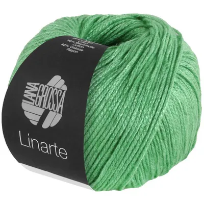 A ball of green yarn with a black label.