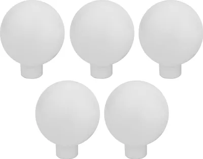 A top-down view of five identical white spherical knobs with cylindrical bases, arranged in a staggered pattern.