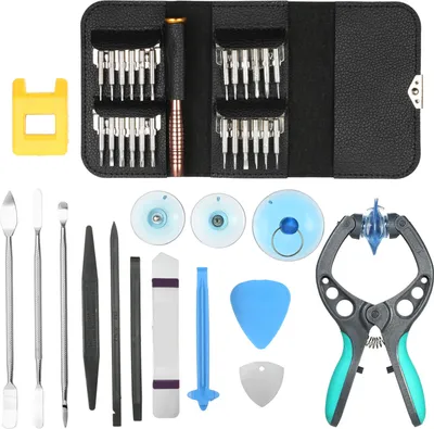 A collection of electronic repair tools laid out on a white background.