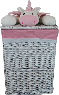 A white wicker laundry basket with a pink fabric liner and a plush unicorn toy on top.