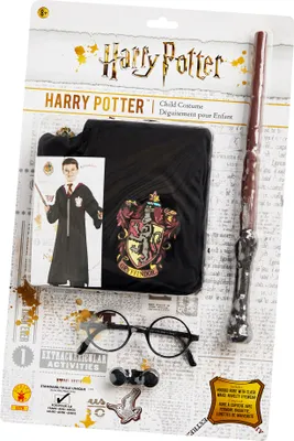 A Harry Potter child costume set is displayed in its retail packaging, which includes a robe, wand, glasses, and other accessories.
