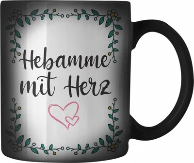 Produktbild von Trendation - Hebamme mit Herz Farbwechsel Zauber-Tasse mit Spruch Geschenk (Schwarz)