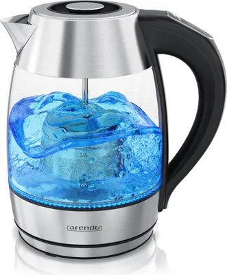A glass and stainless steel electric kettle filled with blue water, with a heating element submerged.