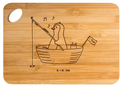 Produktbild von Mr. & Mrs. Panda Schneidebrett Pinguin Angelboot - Transparent - Geschenk, vesperbrett, Optimistisch, Angeln, Frühstücksbrettchen, Genießen, Boot, Frühstücksbrett, Brett