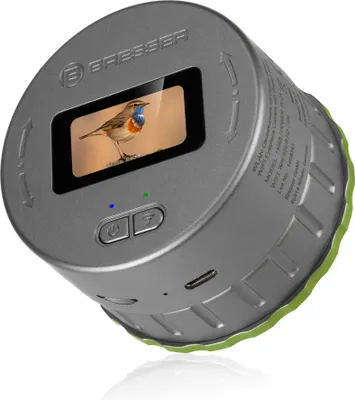 A close-up, studio shot of a digital eyepiece camera.