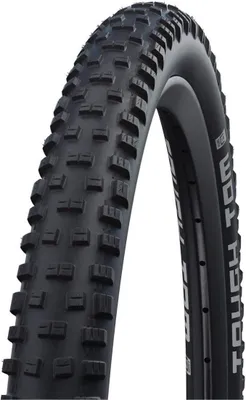 A close-up studio shot of a black bicycle tire against a white background.