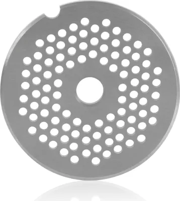 A silver metal disc with many small holes arranged in a circular pattern, with a larger hole in the center. The disc has a small notch on its upper edge.
