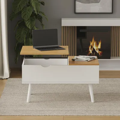A modern living room with a coffee table in front of a fireplace.