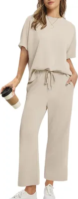 Productafbeelding van Tweedelige zomerset voor dames met shirt met korte mouwen en wijde capribroek, maat M, abrikoos