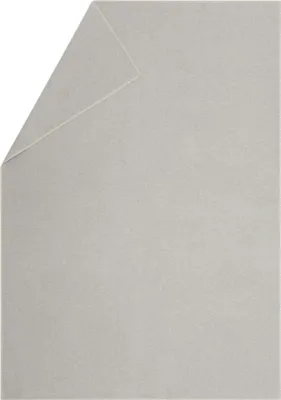 A light gray blanket folded in the corner.