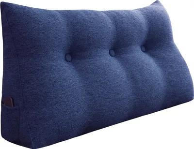 A blue wedge pillow with buttons and a side pocket.
