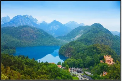 Produktbild von Wallario Wandbild Schloss Hohenschwangau neben dem Alpsee, Größe: 61 x 91,50 cm, Poster mit schwarzem Aluminiumrahmen
