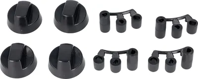 Four black stove knobs and two sets of three black adapters are arranged on a white background.