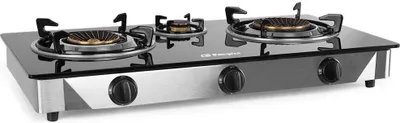 A three-burner gas stove with a glass top.
