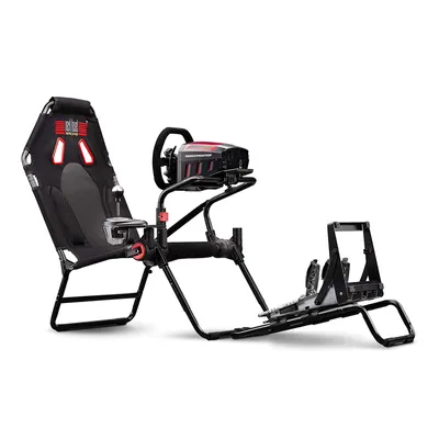 A racing simulator cockpit with a steering wheel and pedals, shown against a white background.