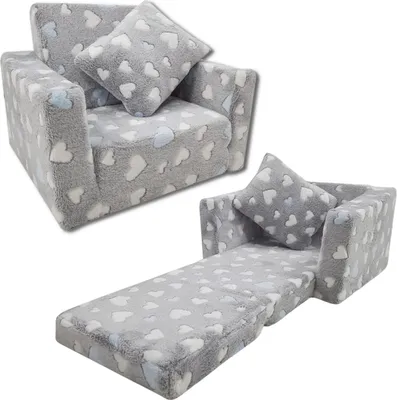 A children's folding chair/sofa with a heart pattern.