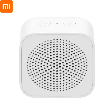 A white Xiaomi portable speaker is shown against a white background.