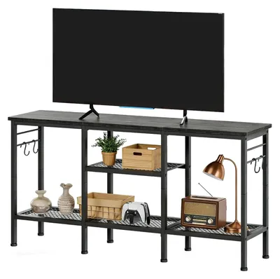 Image de Meuble TV bas et meuble TV - Meuble multimédia - 140 cm - Support pour barre de son - Compartiments ouverts - Système de rangement des câbles - MDF avec structure métallique - Design moderne - Noir
