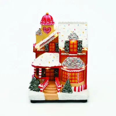 Productafbeelding van ACA Verlichte LED-kerstdecoratie, snoepjeshuis met muziek, werkt op batterijen (3xAA), 14x11x18,5 cm, X0359
