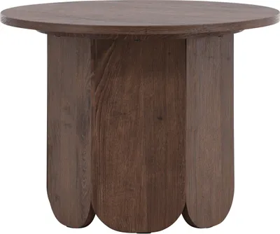 A round wooden coffee table with a unique, carved base.
