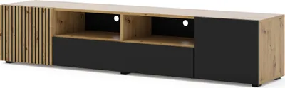 A long, low TV stand with a slatted wood front panel on the left, two open shelves with cable management holes, and two closed cabinets (one drawer-like, one door-like) on the right. The stand is presented against a white background.