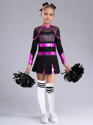 A young girl in a cheerleading costume holding pom-poms.