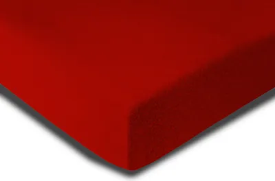 A close-up, angled view of a red fleece fitted sheet.