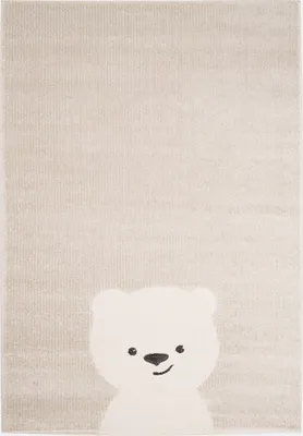 A close-up of a rug with a bear motif.