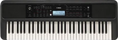 A top-down view of a black Yamaha portable keyboard.