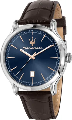 A close-up studio shot of a Maserati watch with a blue dial and a brown leather strap.