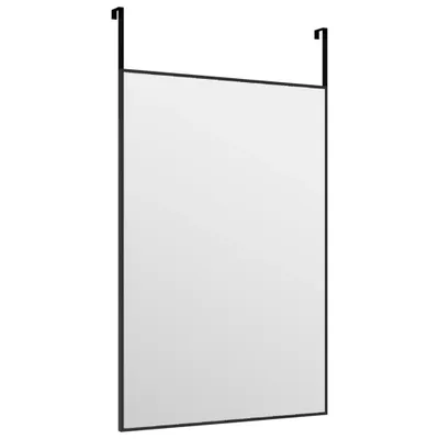 A mirror with a black frame and hooks for hanging over a door.