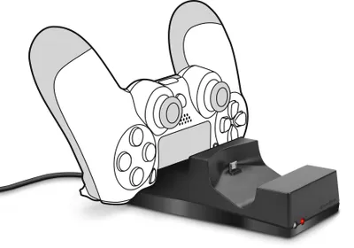 A black charging dock for a game controller, with a white and gray controller placed on it.