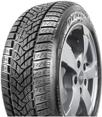 A close-up of a car tire mounted on a silver alloy wheel.