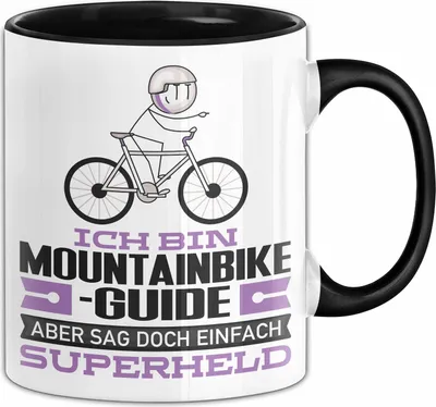 Produktbild von Mountainbike-Guide Geschenk Tasse Ich Bin Mountainbike-Guide Aber Sag Doch Einfach Superheld Lustige Geschenkdiee für Mountainbike-Guide Kaffee-Becher (Schwarz)